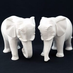 A Pair of Elephants with Trunks Down