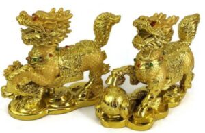 Pair of Camel Bone Feng Shui Chi Lin with Ball and Baby