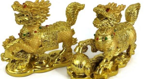 Pair of Camel Bone Feng Shui Chi Lin with Ball and Baby