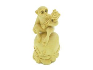 Auspicious Monkey Sitting On Peach And Holding Ruyi1