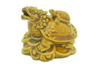 Porcelain Dragon Tortoise On Bed Of Coins And Ingots1