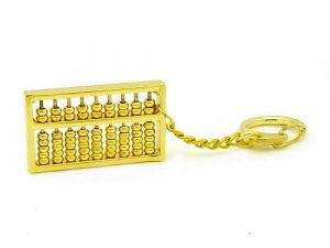 This is an abacus made into a keychain from brass and plated with gold.