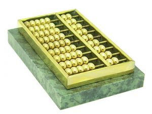 This abacus is made of high-quality brass adhered to a heavy rectangular marble piece. 